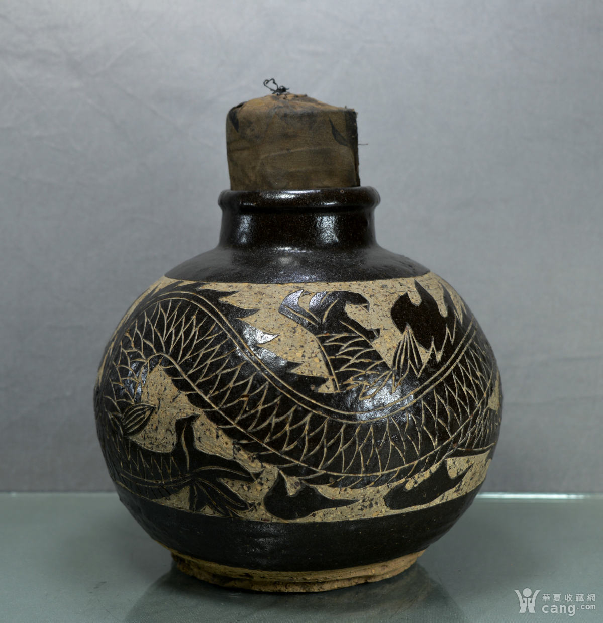 明磁州窑黑釉剔花龙纹罐(古296)